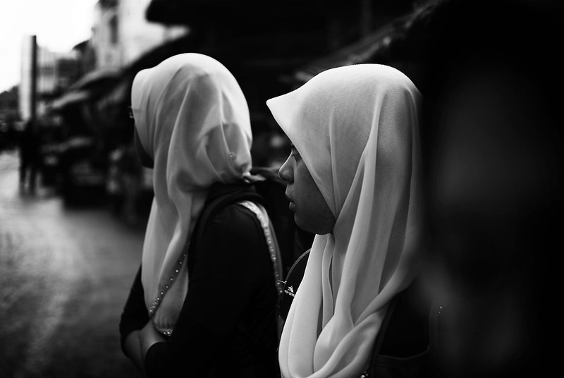 Muslim women, men, and the Hijab